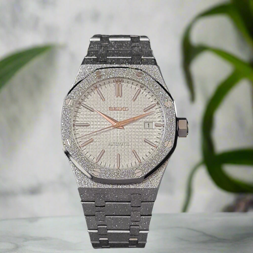 Silver watch with a marble background