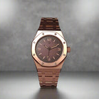 A bold statement piece that fuses modern luxury with everyday power.

With its rich brown dial and striking rose-gold case, The Amber Forge is designed to stand out without compromise. Featuring a distinctive octagonal bezel, matching metal bracelet, and dependable automatic movement, this watch delivers both elegance and resilience.