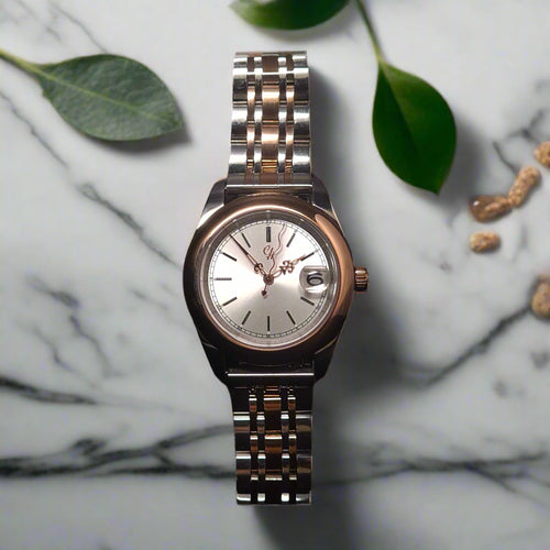 Silver watch with a dark background