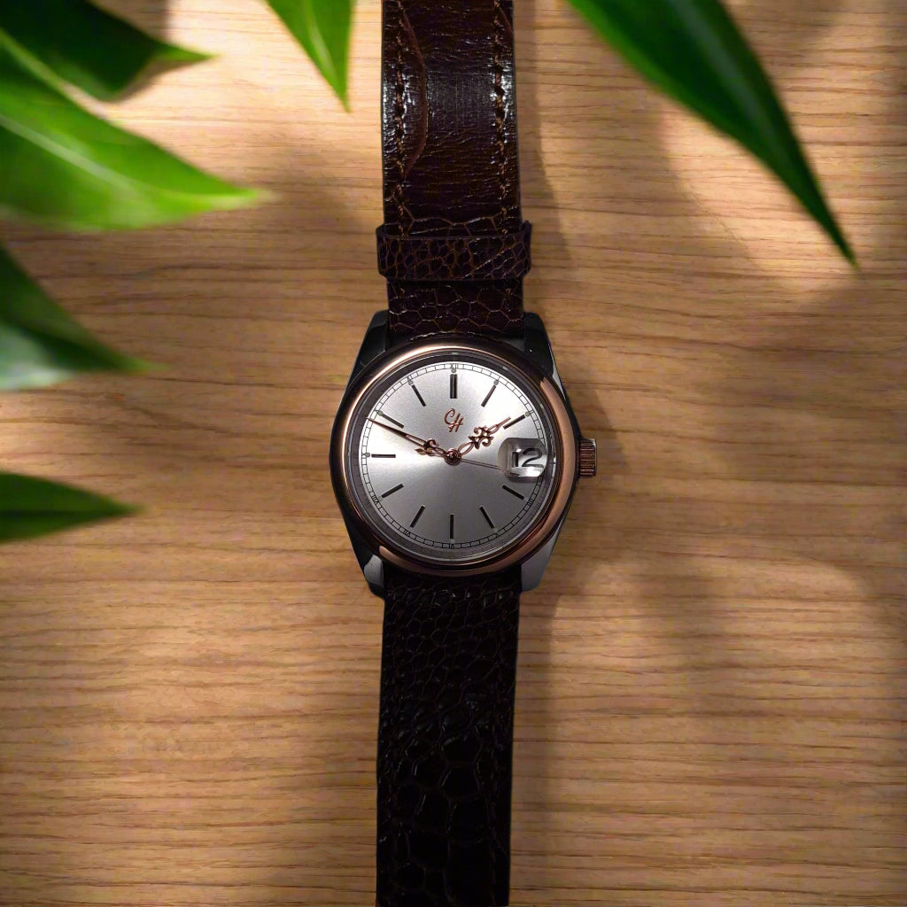 Inspired by vintage luxury icons, this unisex design delivers timeless appeal for under $250 AUD.