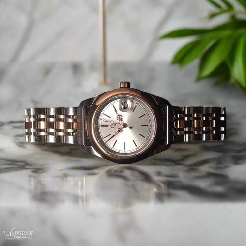 Luxury watch on marble bench