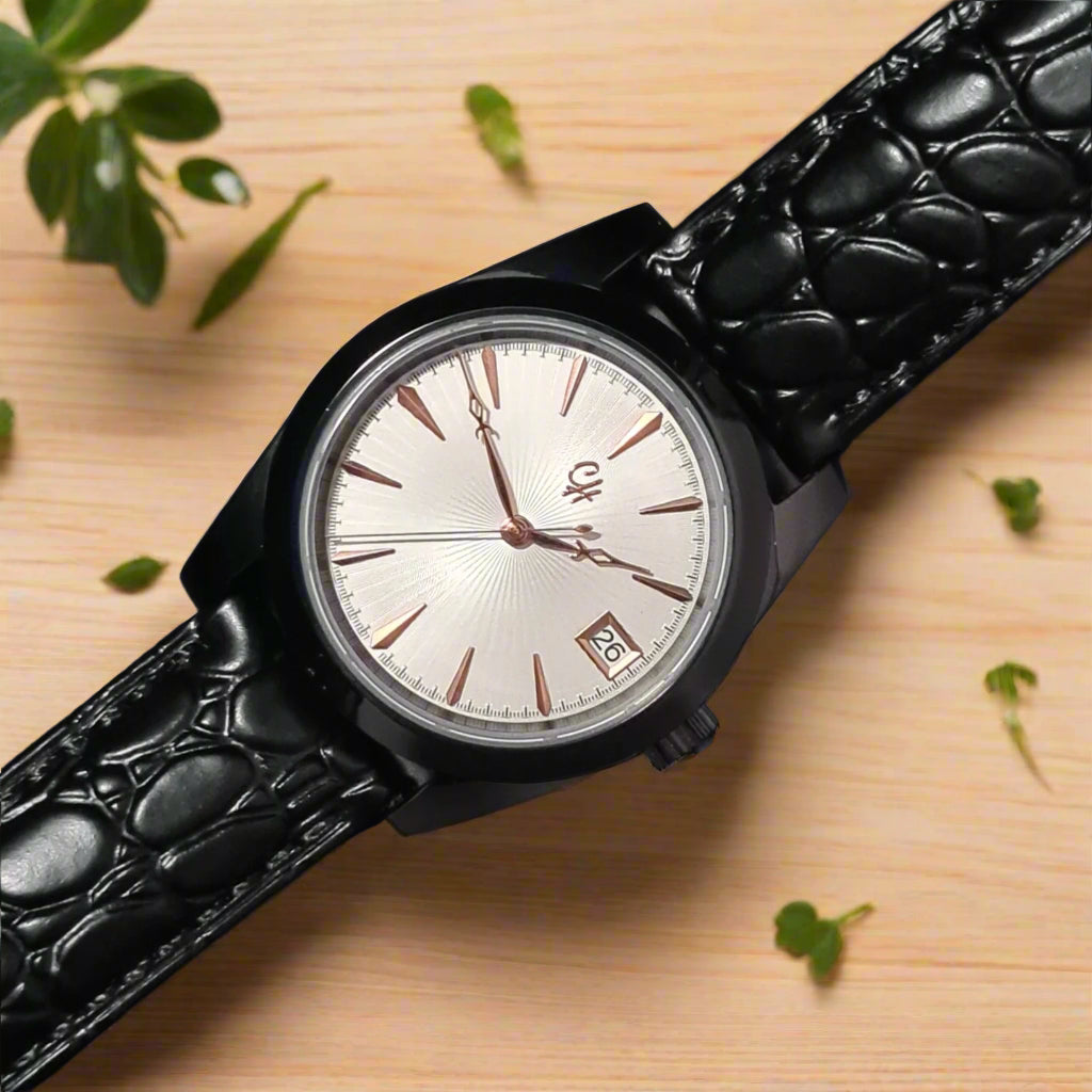 Black wristwatch with a textured strap on a dark background