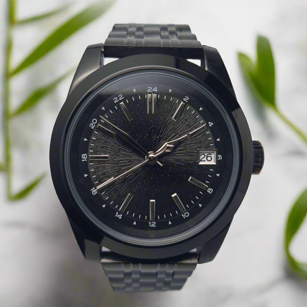 Black wristwatch with a detailed face on a white background