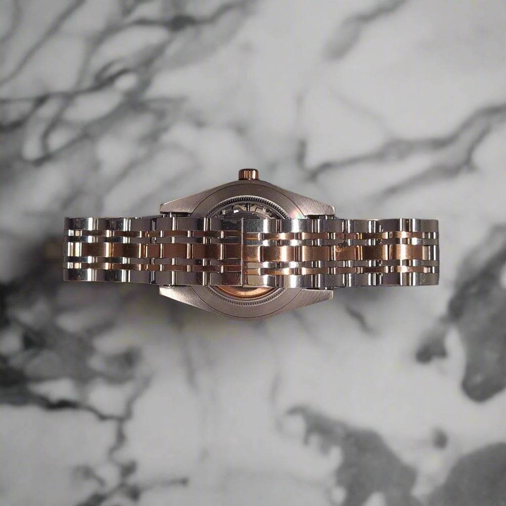 Back of watch on marble bench